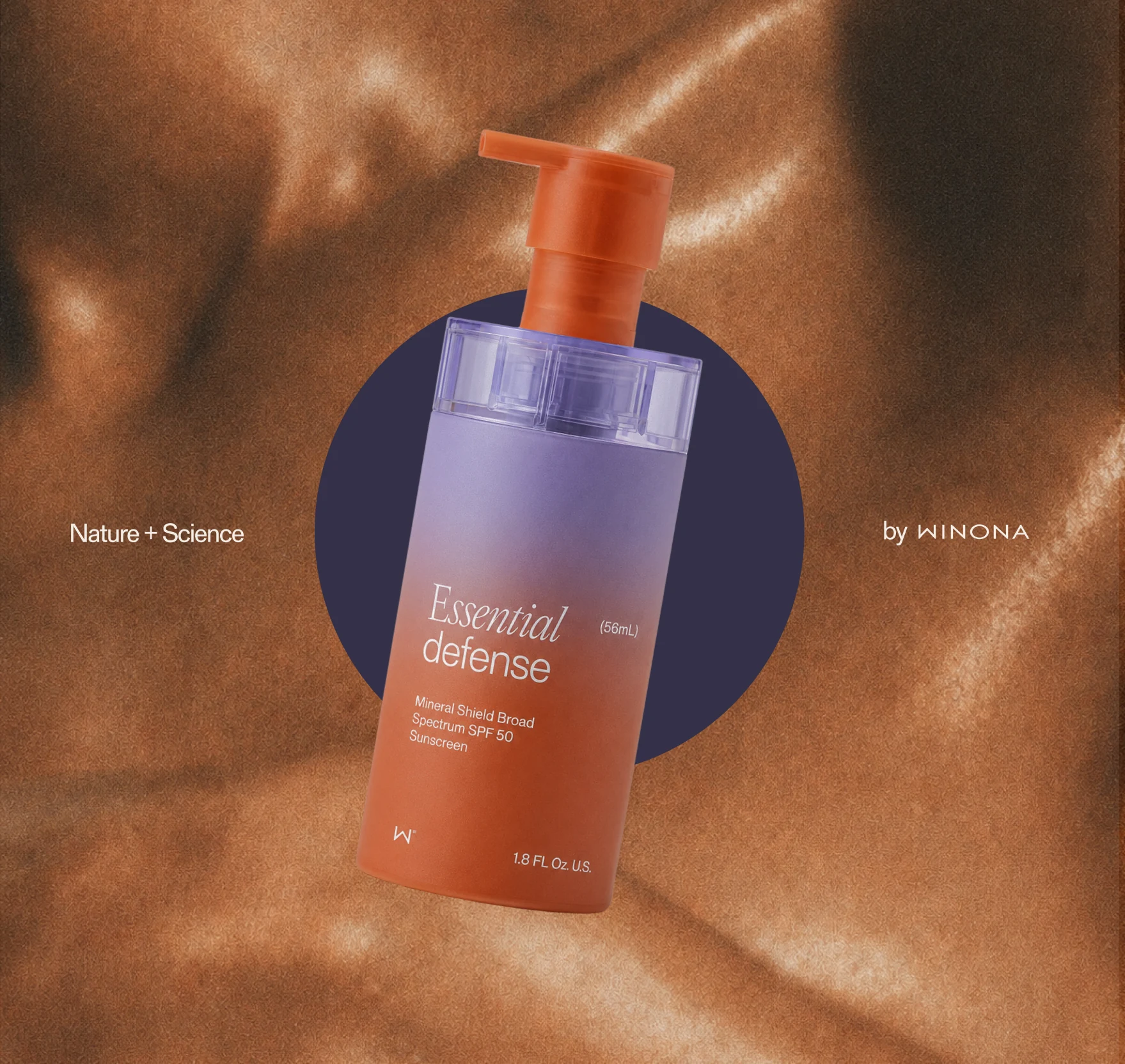 Winona Essential Defense bottle on satin.