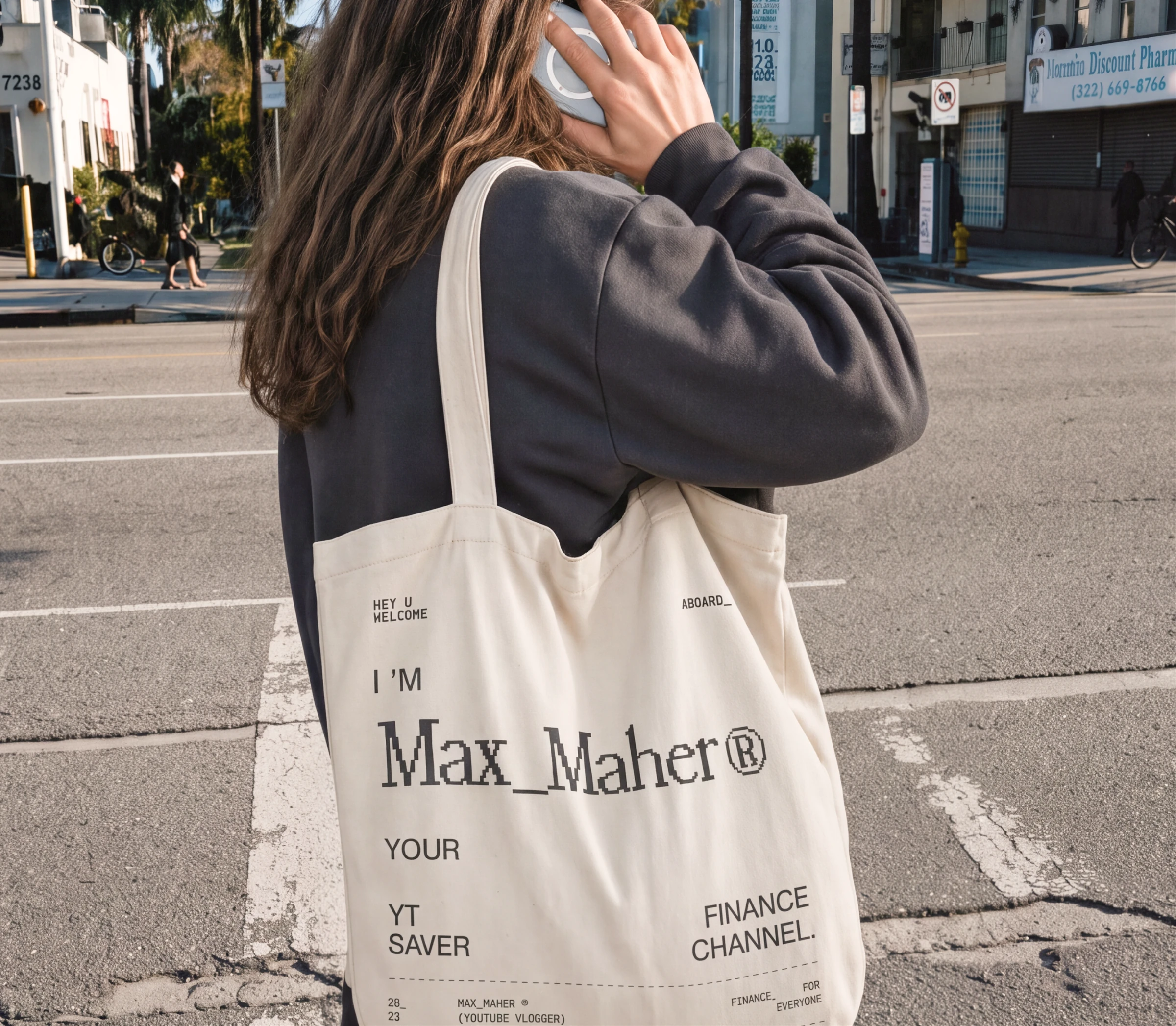 Max Maher branded tote bag photographed in the street.